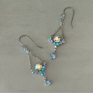 Elegant and Iridescent Crystal Chandelier Earrings, Set in Silvertone